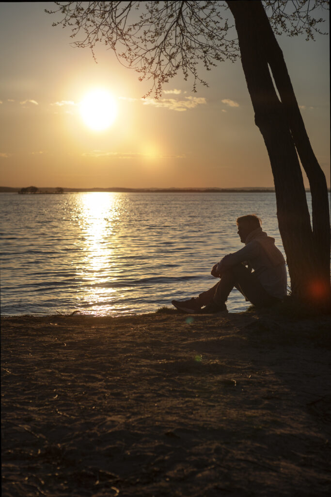 Sad Contemplative Person Near Lake 1 683x1024